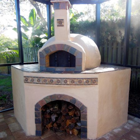 Home pizza oven with custom tile and a cement finish built by Forno Nardona.