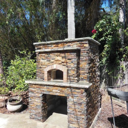 Large Nardona Firenze outdoor wood fired pizza oven with a real stone finish.