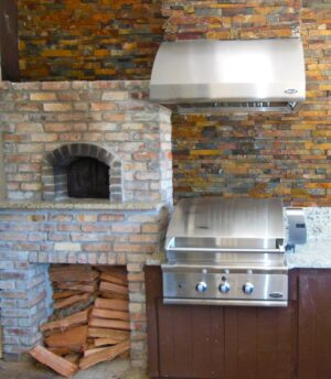 A Forno Nardona wood fired pizza oven installed in an outdoor kitchen.