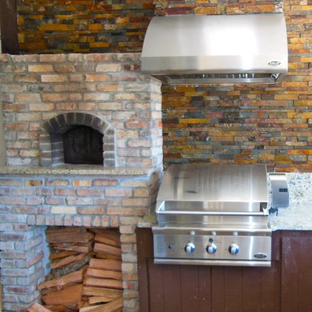 A Forno Nardona wood fired pizza oven installed in an outdoor kitchen.