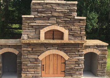 Multi-tiered Forno Nardona Firenze oven with wooden doors.