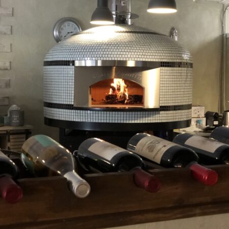 Forno Nardona Napoli Commercial wood fired pizza oven with face plate engraved "Cafe Sahara", a Mediterranean restaurant located in Largo, FL.