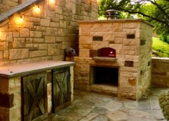 A large, stone outdoor Firenze pizza oven.