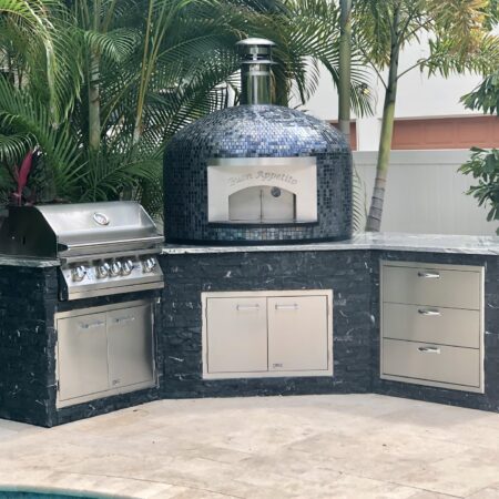 Forno Nardona outdoor kitchen complete with Lion Grill and accessories and a Forno Nardona Napoli oven with face plate engraved "Buon Appetito".