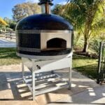 Forno Nardona Napoli pizzaoven with blank stainless face plate in grey with white triple stripes on white stainless stand with electronic burner.