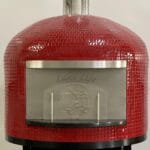 24" Forno Nardona Napoli in red glass tile with custom engraving which reads Lake Life and the door has an etching of a bear and a lake.