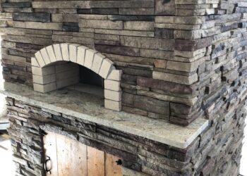 Forno Nardona Firenze Oven on a Nardona Base in Chardonnay Ledgestone with Wooden storage door.