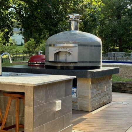 This is just one of Forno Nardons's Napoli 40" residential pizza ovens in Ohio backyard surrounded by trees.