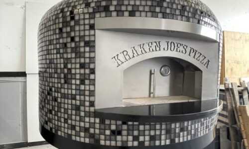 Forno Nardona Napoli 40" Commercial with Kraken Joes Pizza written on the stainless faceplate. oven sits on a black stand.