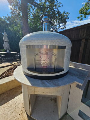 24" Napoli in Ice White recycled glass tiles with a personalized exterior door