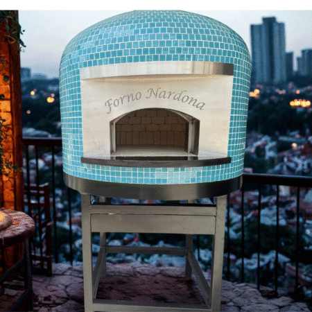 24" Napoli on a balcony with a city setting behind it.