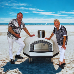 Commercial Nardona Rustico Oven in black and white with it's new owners at the beach.